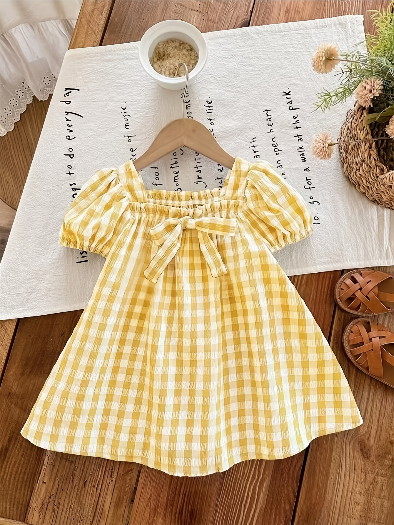 yellow baby dress sold on Temu Canada yellow baby dress sold on Temu Canada