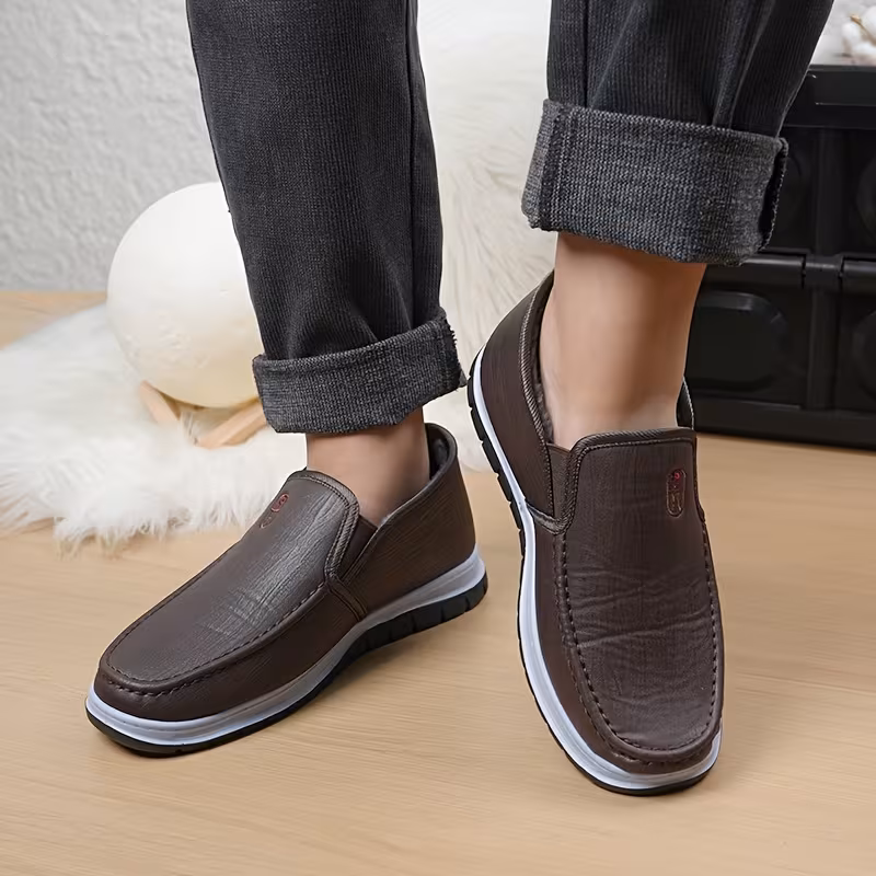 mens winter boots slip on ankle boots with a flat design black insulated footwear featuring thickened warm lining low heeled round toe non slip solid color minimalist style outdoor pvc sole hiking shoes Product details 7