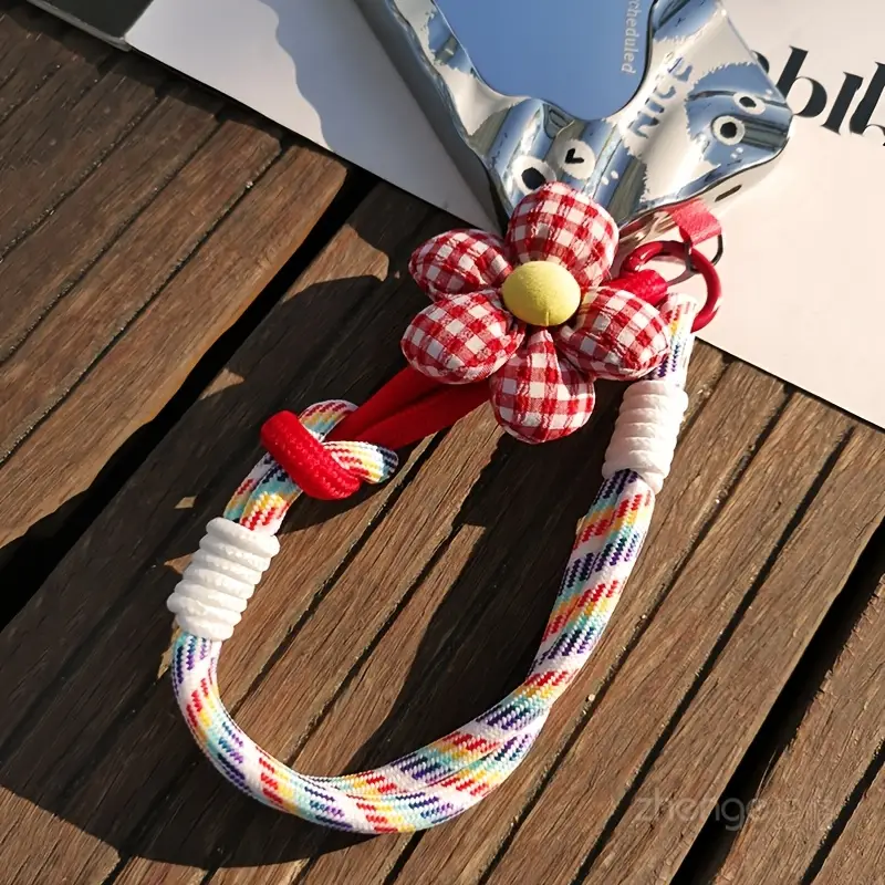 Foto de Strap/correa de mano adaptable a cualquier celular.