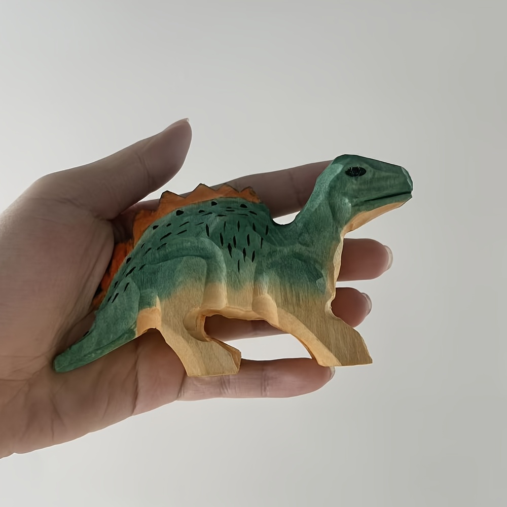 Image of A Small Wooden Dinosaur Figurine, Handcrafted And Carved, Serves As A Decorative Piece For The Desk, Perfect For Home Decor, Birthdays, Anniversaries, Housewarming, And Christmas