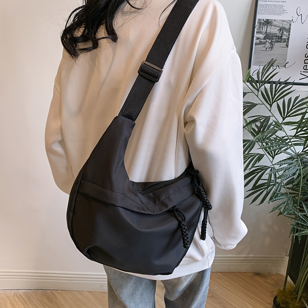 E-shop Eine trendige, großvolumige Umhängetasche in Dumpling-Form. Diese neue Handtasche im koreanischen Stil ist für Reisen, Arbeit, Shopping,