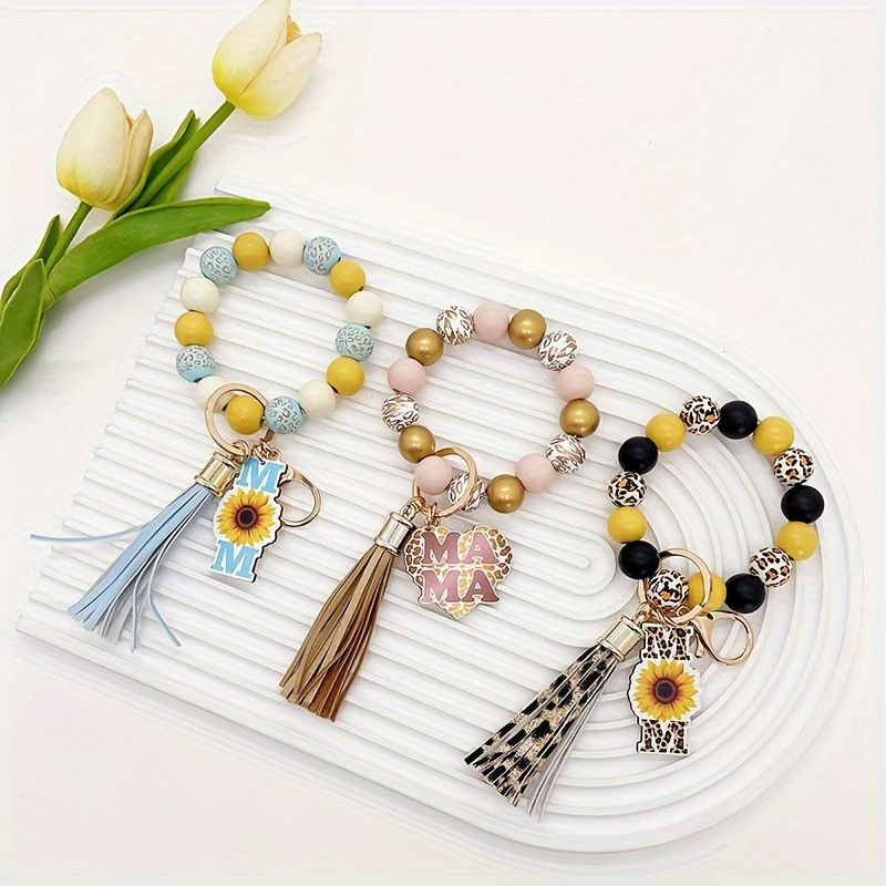 

Printed Wooden Bead Tassel Keychains With Sunflower & Mama Charm, Boho Bag Accessory For Mom