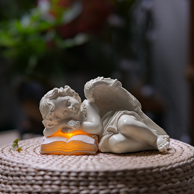 Image of Statue Resting On A Book - A Resin Garden Ornament, Suitable For Decorating Yards, Lawns, Desks, And | For A Friend