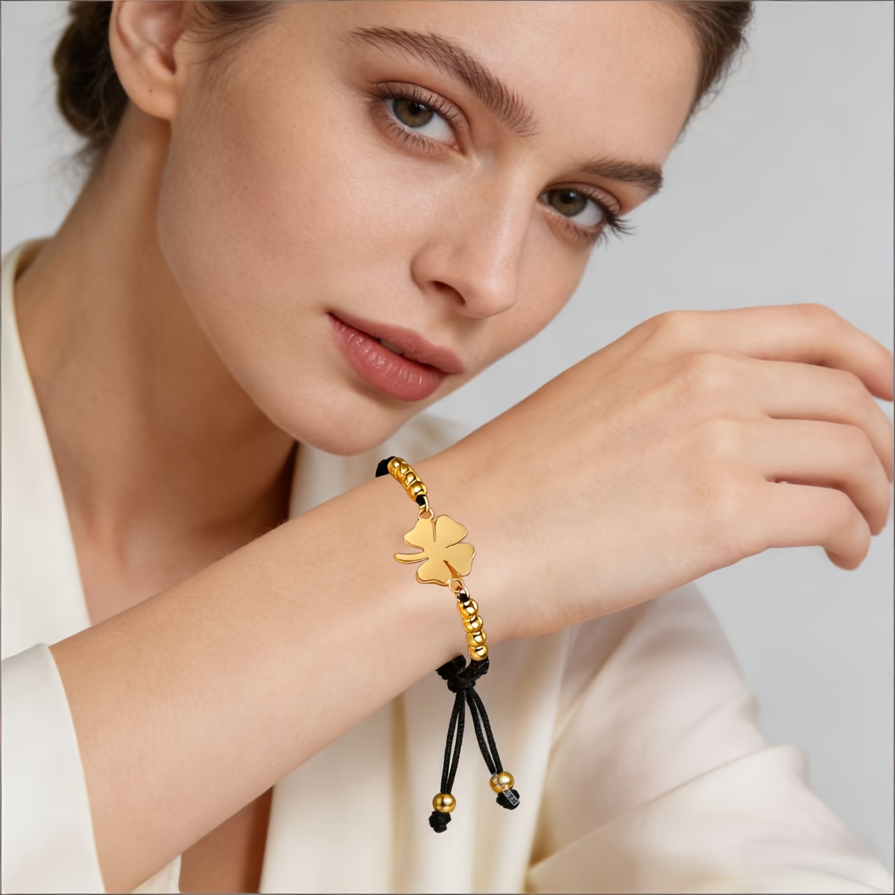 Red/Black Braided Rope Bracelet with Golden Clover Pendant