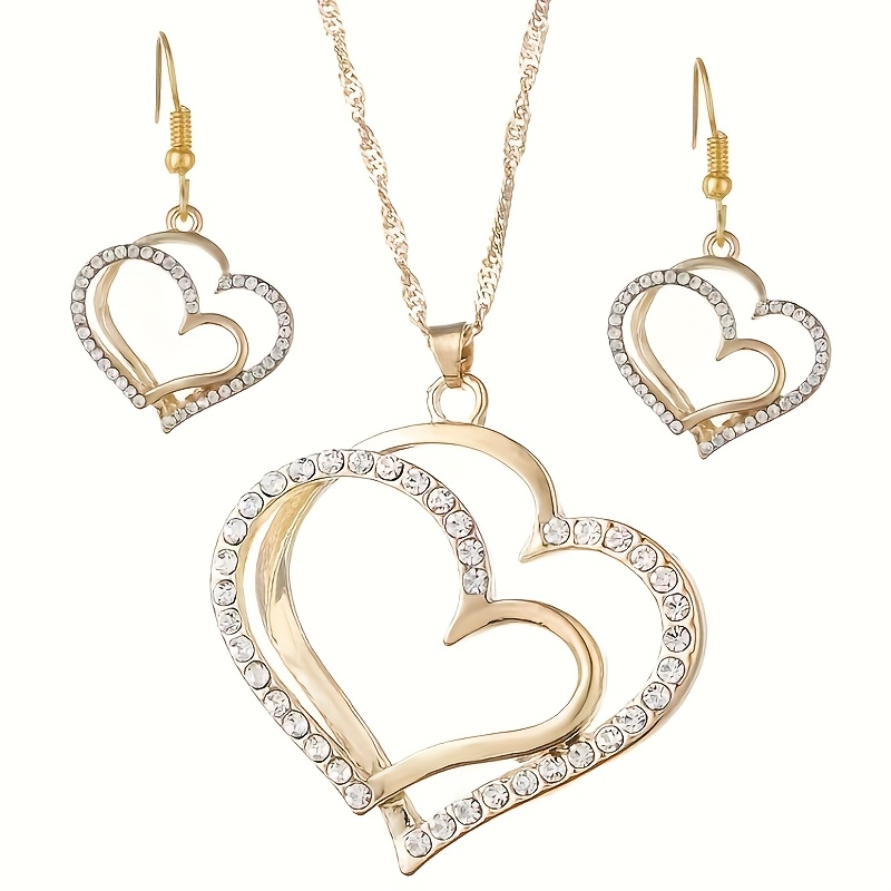 a creative and unique jewelry set consisting of 1 pair of earrings and 1 necklace featuring a sparkling heart shaped design with shiny rhinestones   accessorizing daily outfits or party wear details 1