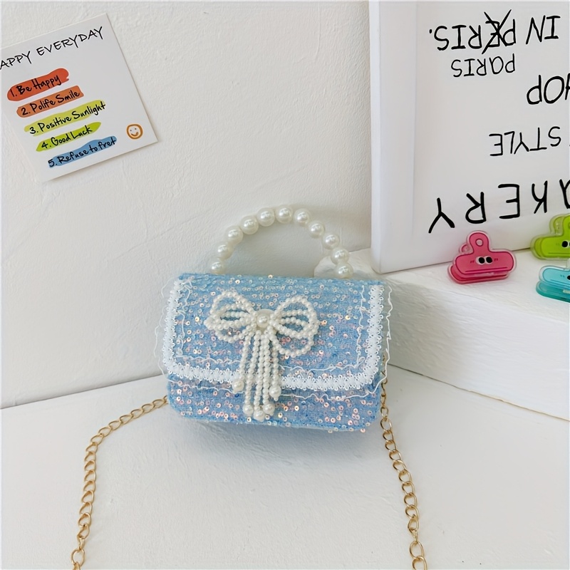 Image of A Lady's Crossbody Bag. Its Light And Mini Size Is Suitable For Carrying Lipstick And Snacks On A When School. A Nice Birthday Or Festival Gift.