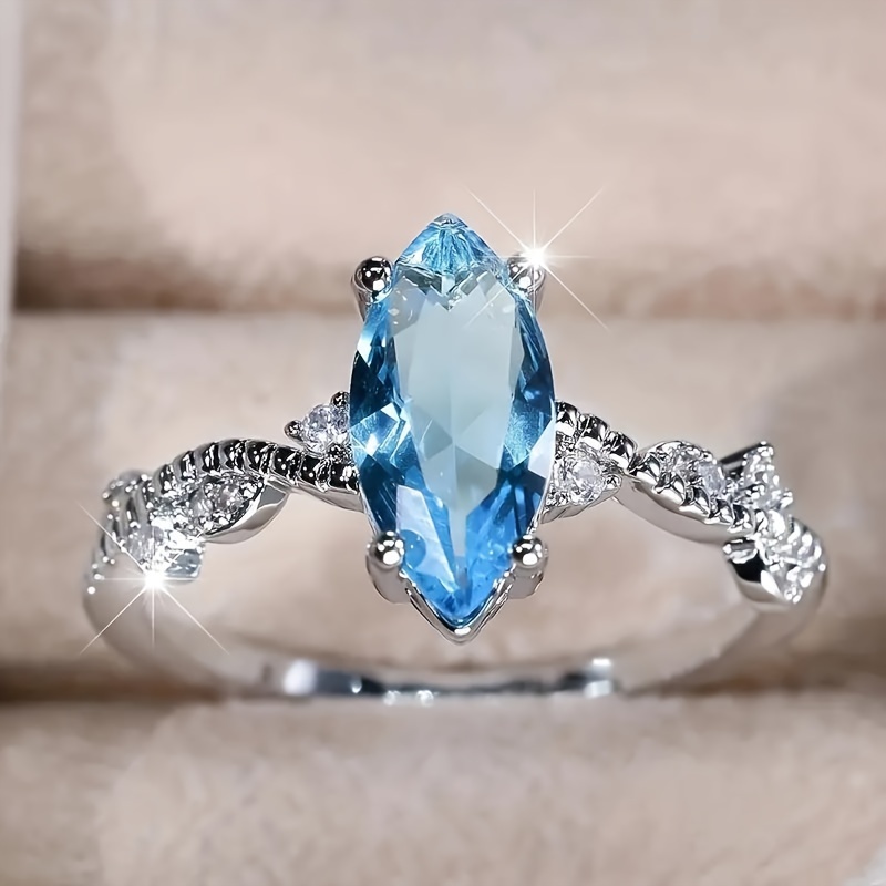 

Bague de mode pour femmes en dentelle argentée avec Zirconia en d'œil de cheval bleu élégant et , cadeau d'anniversaire de fête, fiançailles, mariage et anniversaire