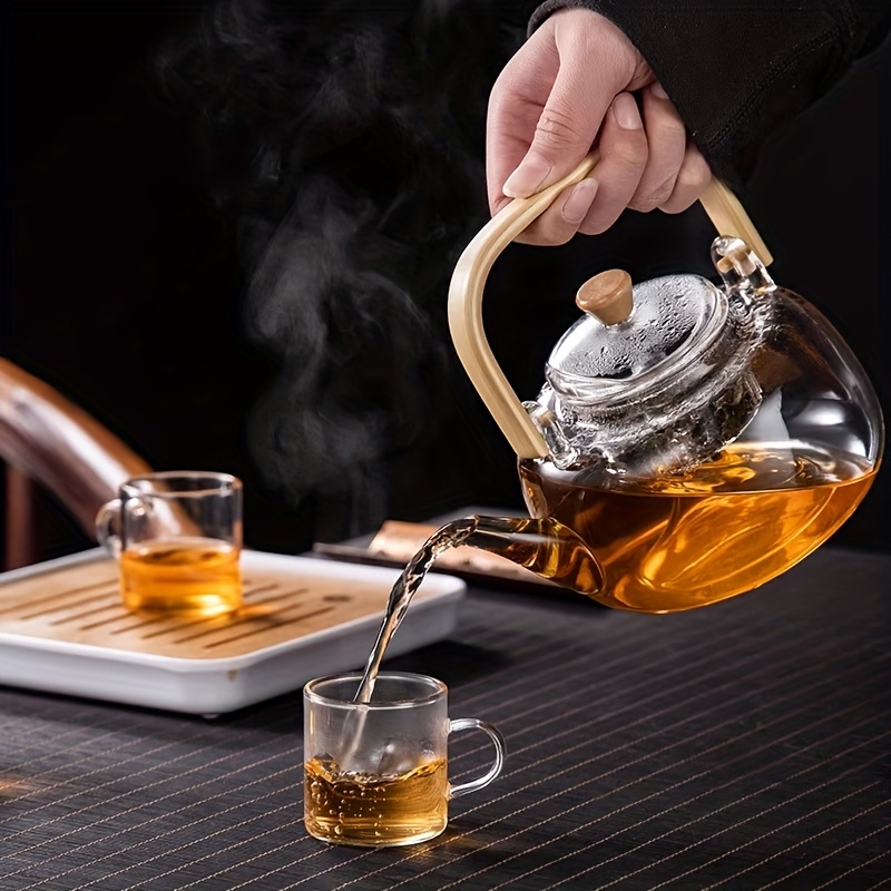 1 db 950 ml-es üveg teáskanna, alkalmas tea főzésére, használható nyitott láng fölé, átlátszó kávésüveg, bambusz fogantyú virágos teához, vízforraló elektromos kerámia tűzhelyre, teáskanna délutáni teához Termék részletei 2
