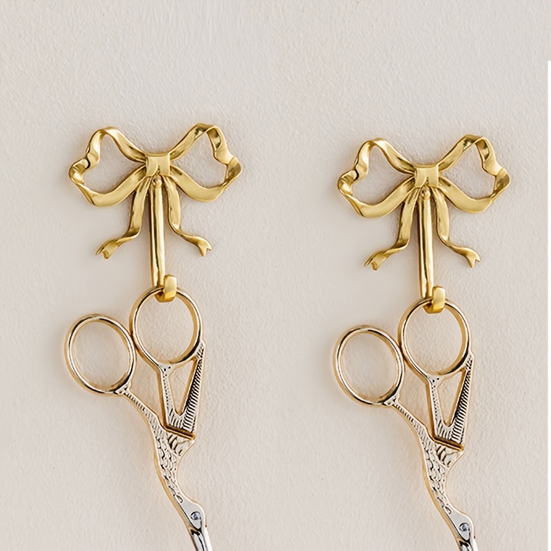 TEMU 2pcs Tie Wall Hook Set - Sturdy Metal Hooks With A Stylish Bow Tie Shape, Designed For Screwing Into Walls For Hanging Keys, Hats - Finished For
