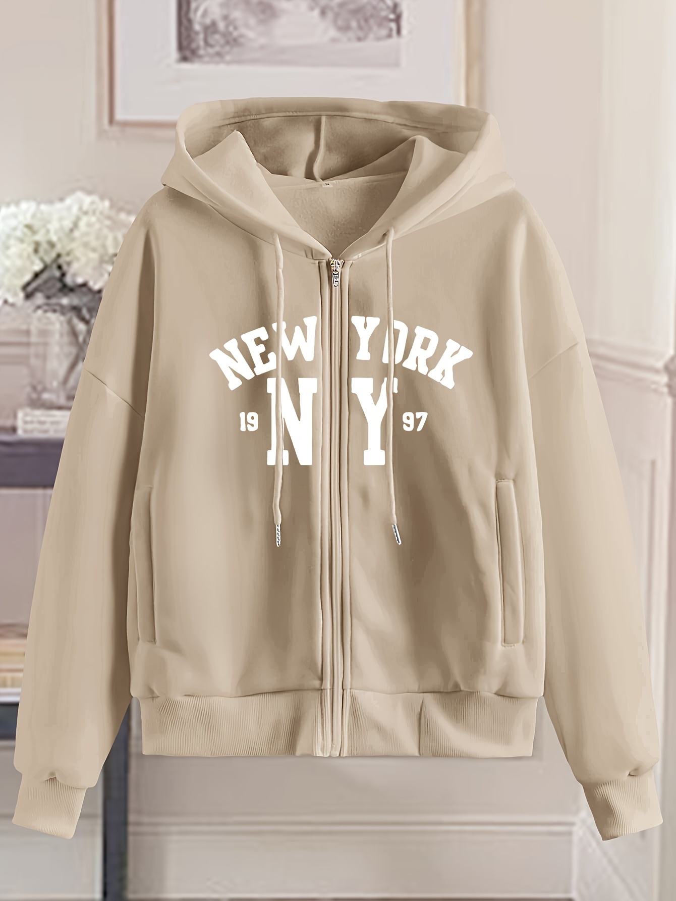 white zip up hoodie sold on Temu United States