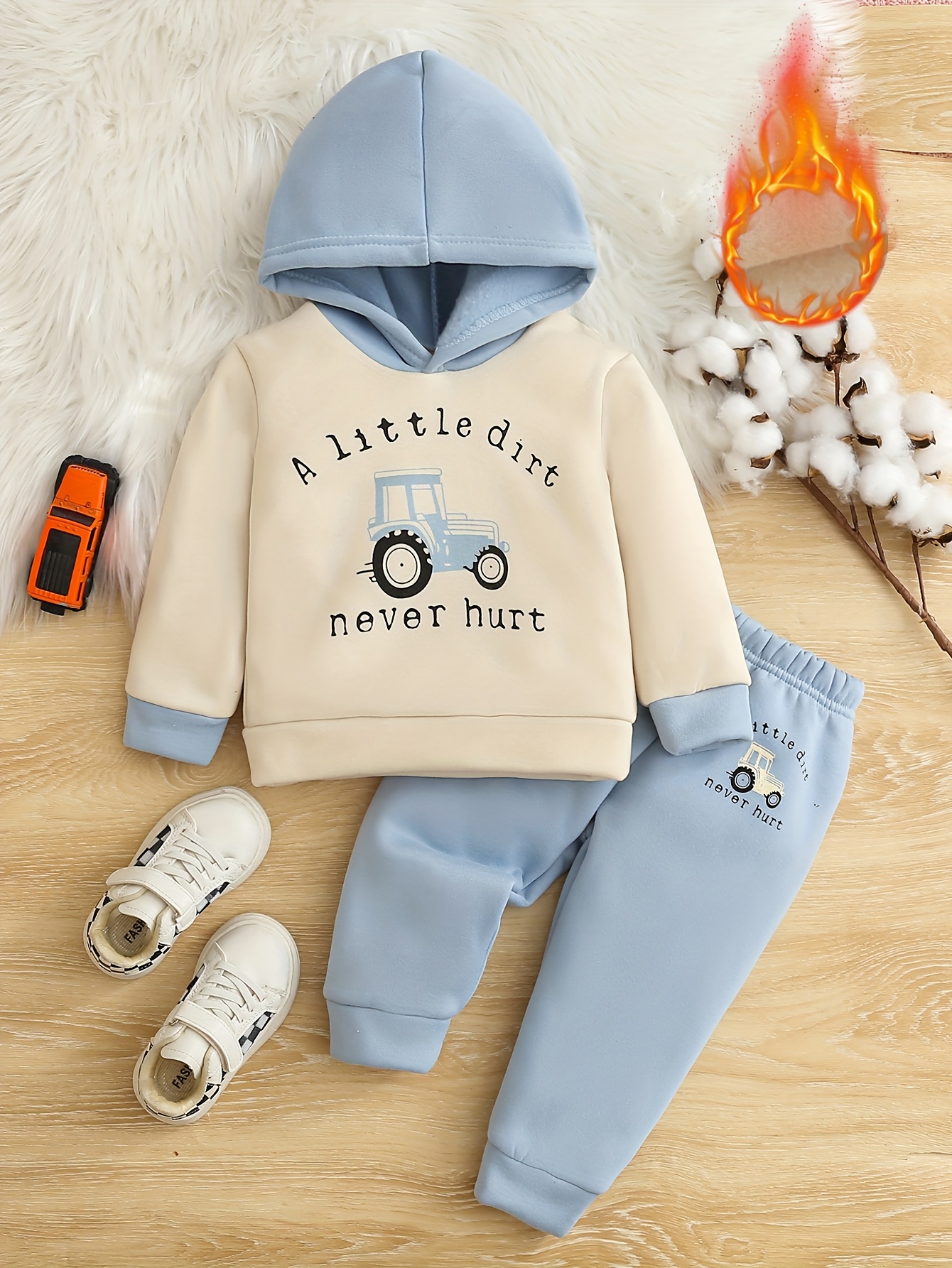 sachin and babi light blue dress How to Dress a Newborn in Winter: 11 Baby Winter Tips