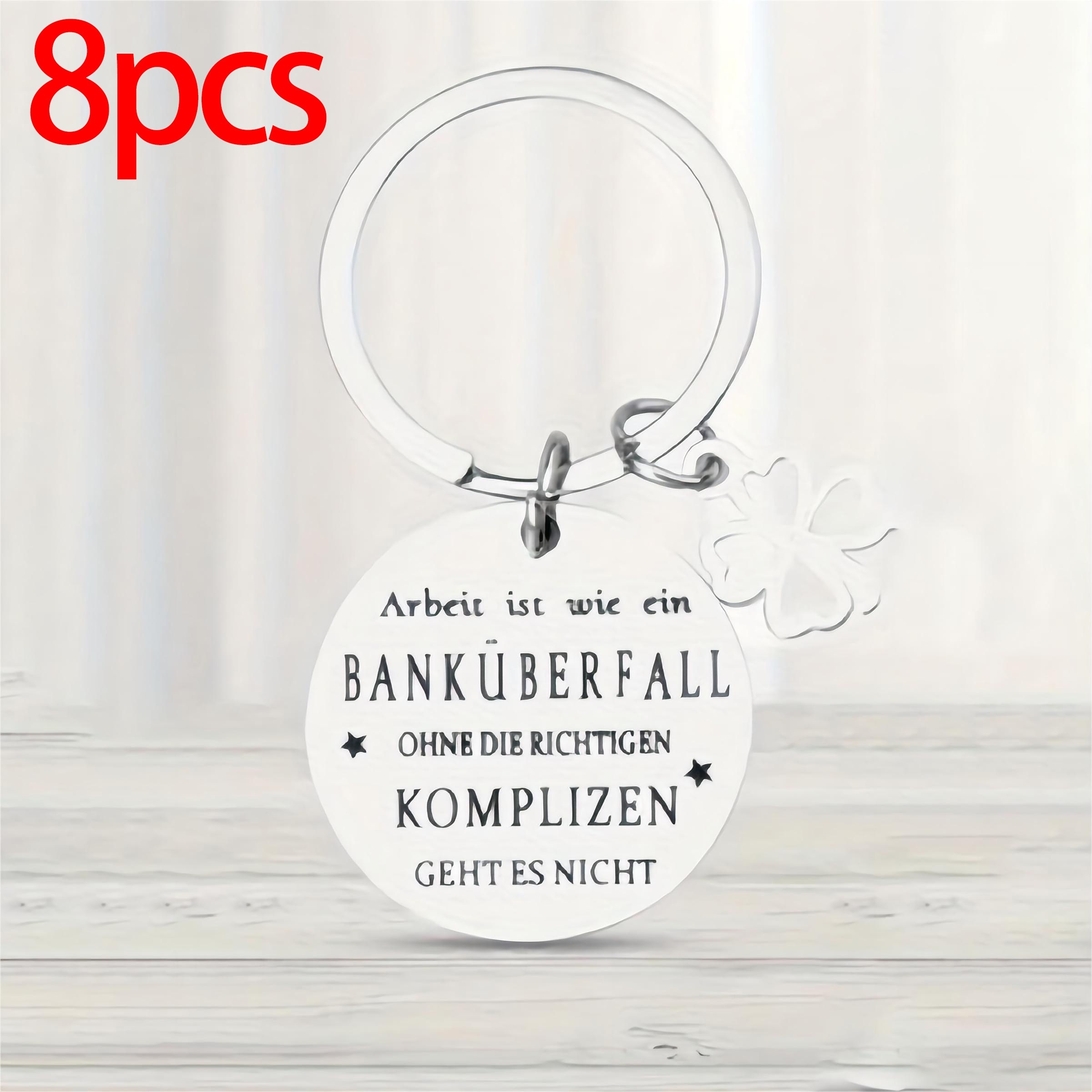 An 8pcs Stainless Steel Round Keychain Set As A Farewell Gift For A Colleague