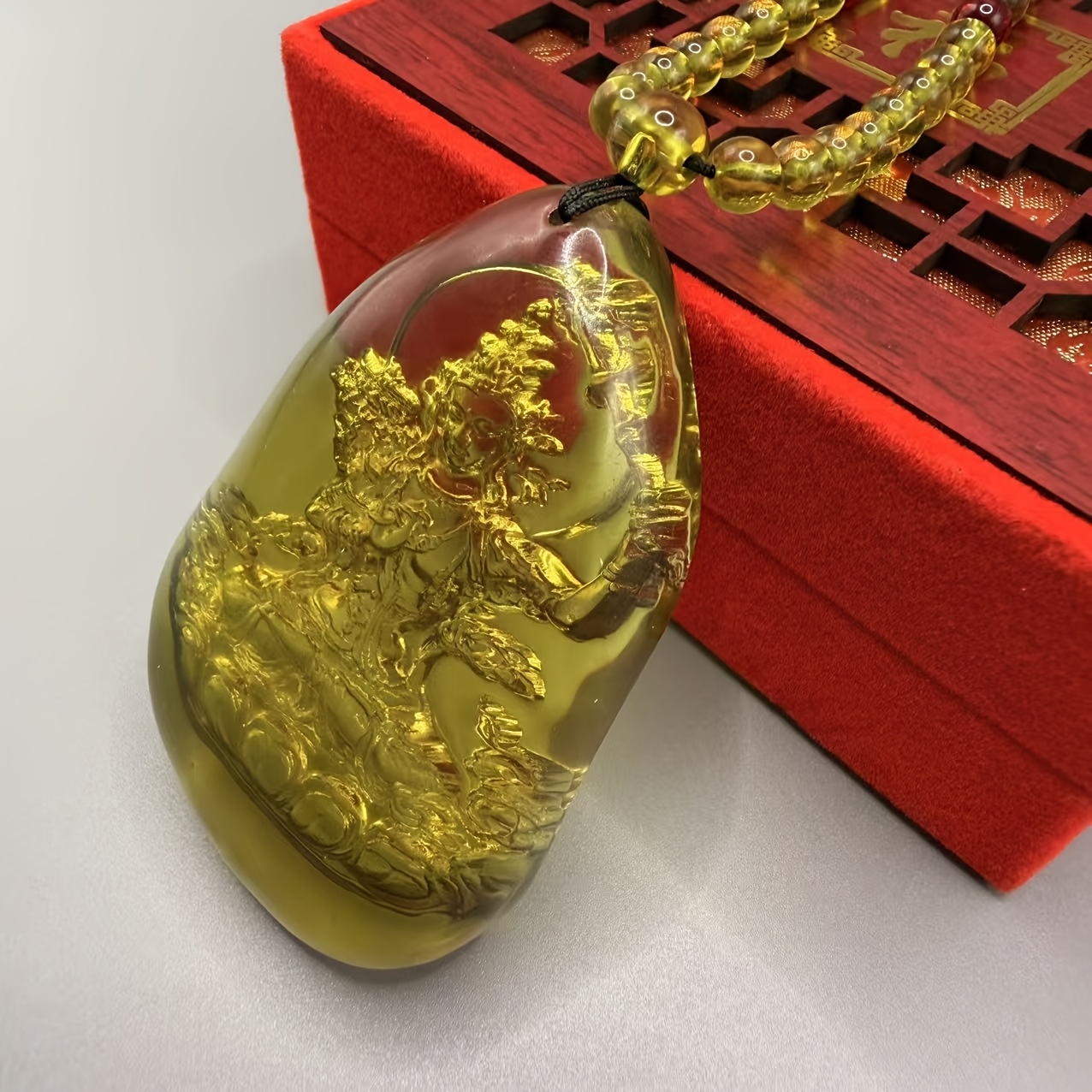 Dominican Amber Ksitigarbha Bodhisattva Pendant Necklace
