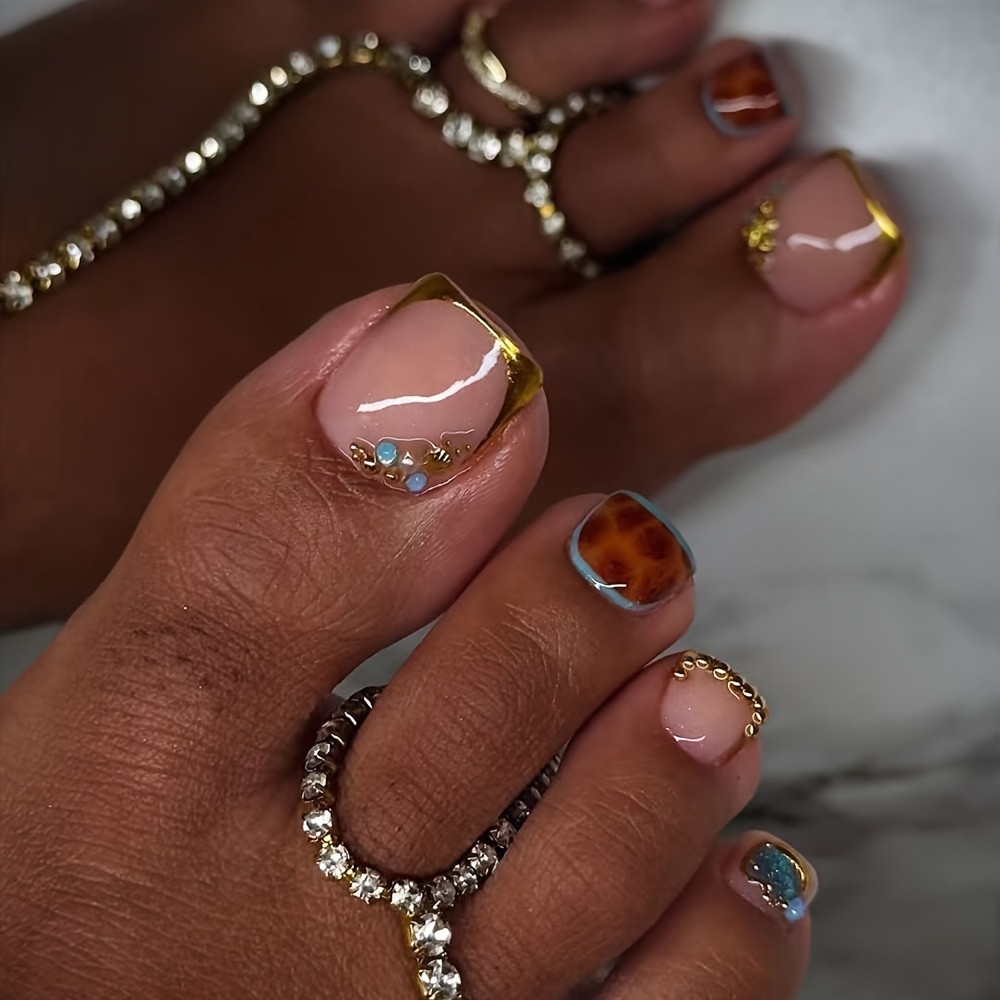 TEMU 24pcs Short Press-on Toenails, Sheer Pink Base With Golden Edging, Amber Gradient And Blue Diamond Embellishments, Exuding Luxury Vacation Vibe.