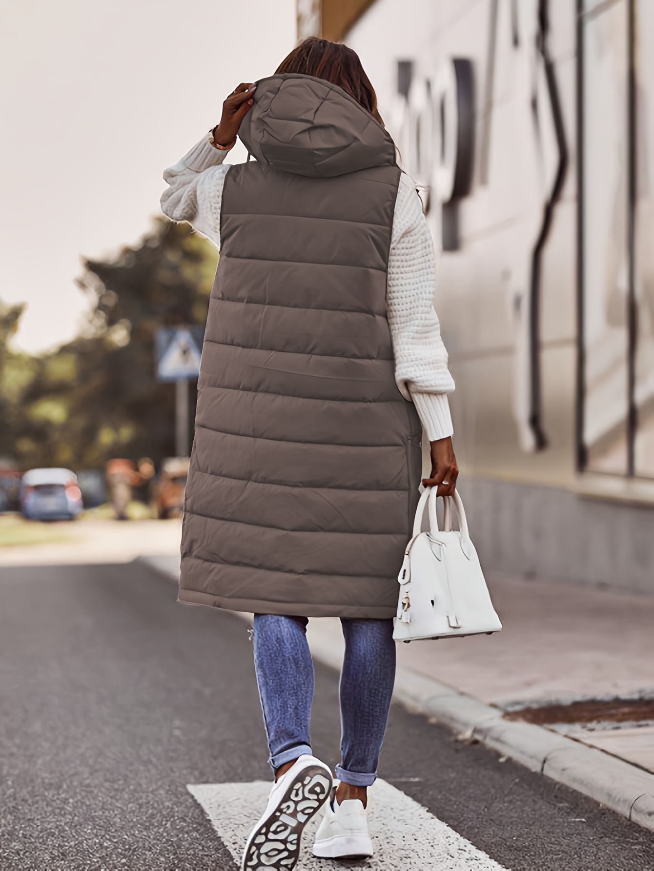 womens long hooded vest casual sleeveless polyester quilted jacket with front zip closure and pockets solid color black warm non stretch fabric ideal for fall winter layering details 25