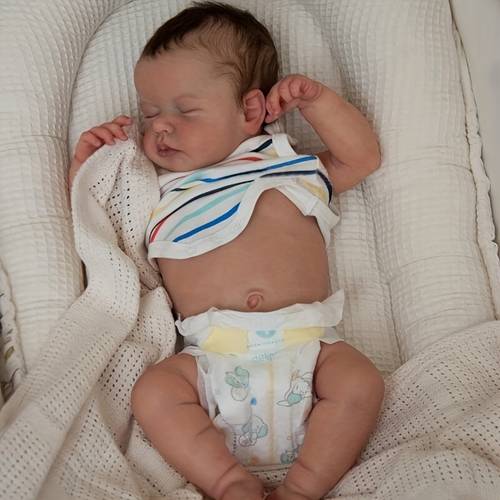 doll is realistic the newborn baby is soft all over and made of vinyl 20 inches