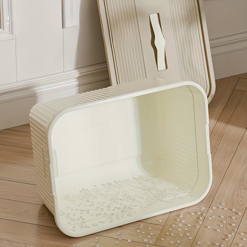 three lidded plastic storage boxes stackable organizing containers with snap seals and handles suitable for home storage for in closets kitchens bedrooms and living rooms in cream yellow measuring 38 5 28 5 18 5cm Product details 3