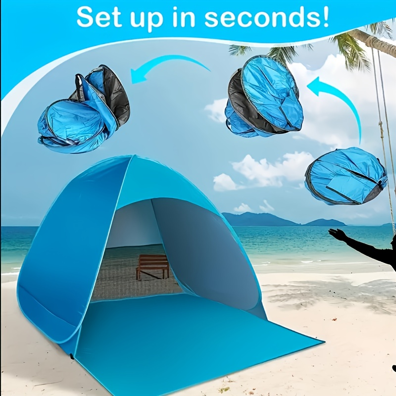 TEMU A Portable Beach Tent That Pops Up, Designed As A Sunshade For Outdoor Activities Like Camping And Fishing, In Blue And Green. This Camping