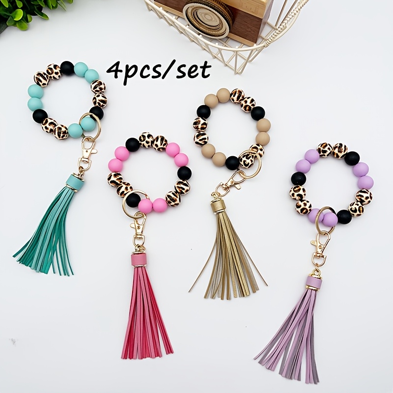 

4pcs Set Of Chic Leopard Print & Solid Wooden Bead Wrist Keychains With Tassels - Stylish Women's Accessory, Ideal Gift For Mom Or Friend