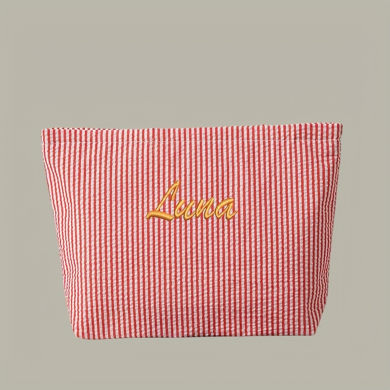 TEMU entre 9 colores, esta bolsa de maquillaje de tela de gasa burbujeante es fácil y refrescante. Puede usarse como una bolsa de almacenamiento o un