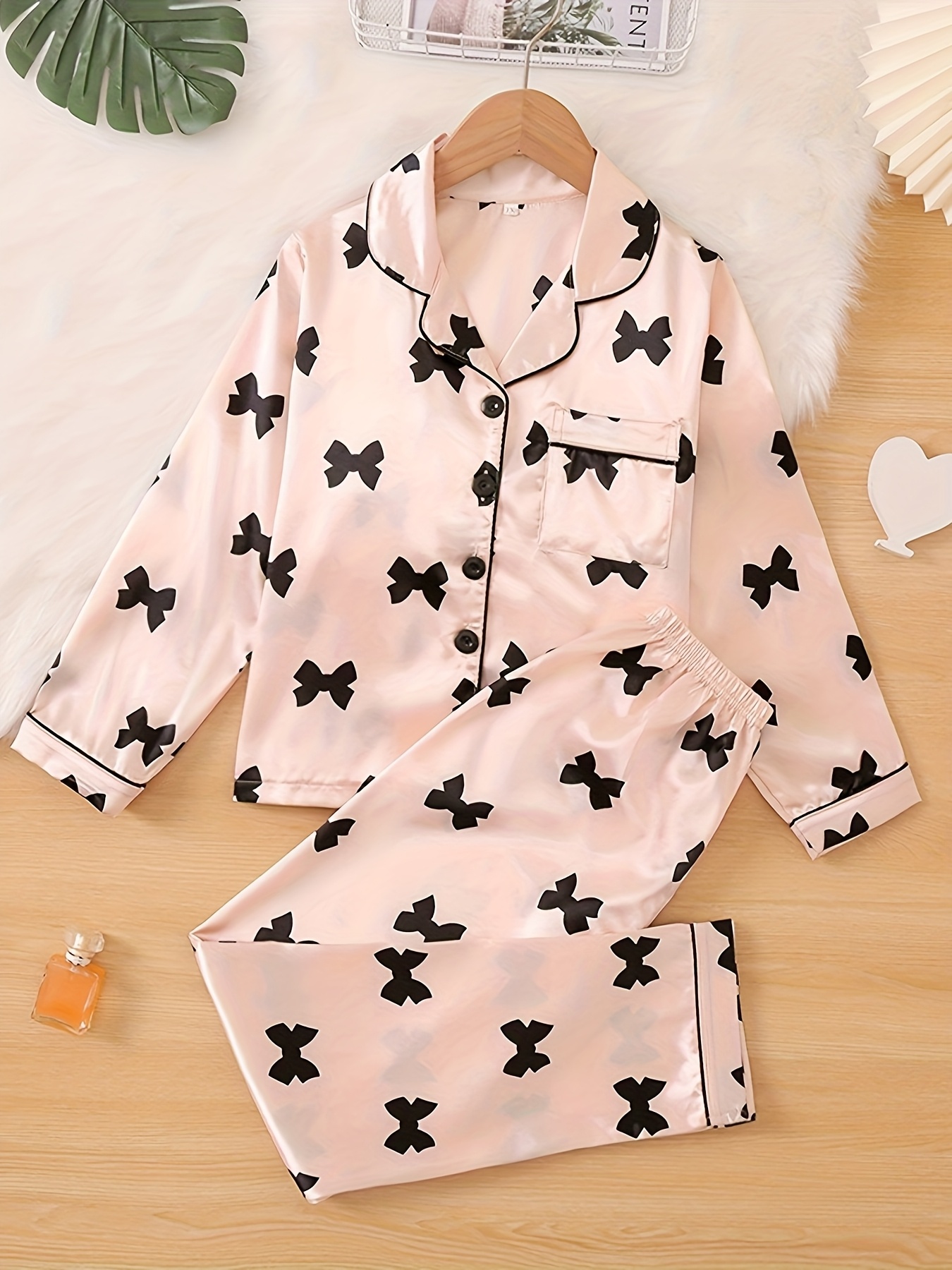 girls silk pajamas sold on Temu United States