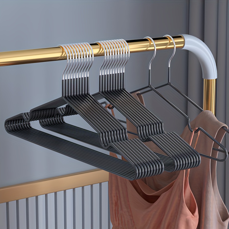 wyx hangers are elegant and modern metal clothing hangers featuring a non slip   for a minimalist home aesthetic details 2