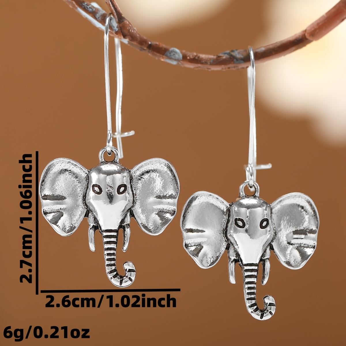 Women's Retro Distressed Elephant Head Long Earrings — Party Ready