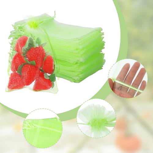 item picture 100pcs fruit protection bags green strawberry netting cover drawstring mesh bags fruits protectors pest barrier for tomato mango blueberry fruits trees veggies garden small fruit