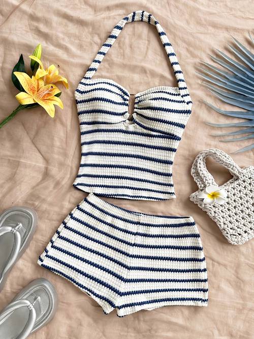 lady wears an and white striped top and shorts as a beach vacation casual 2pcs set in thailand