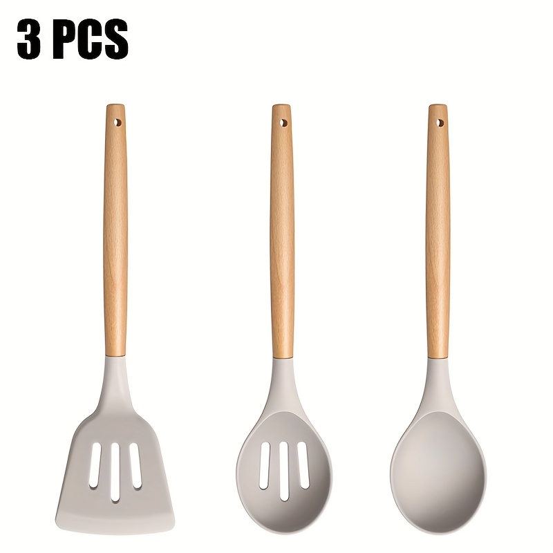 Image of Set Of 3 Kitchen Tools Made Of Nonstick Silicone With Wooden Handles - Includes A Slotted Spatula, A Strainer Spoon, And A Soup Ladle - Heat Resistant Up To 450°f And Safe For Dishwasher Use