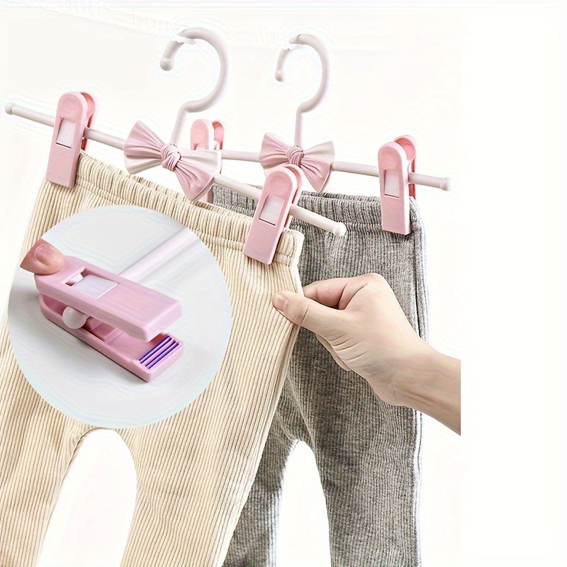 retractable 11 27 inch plastic pants hanger with bow clips   kids clothes details 14