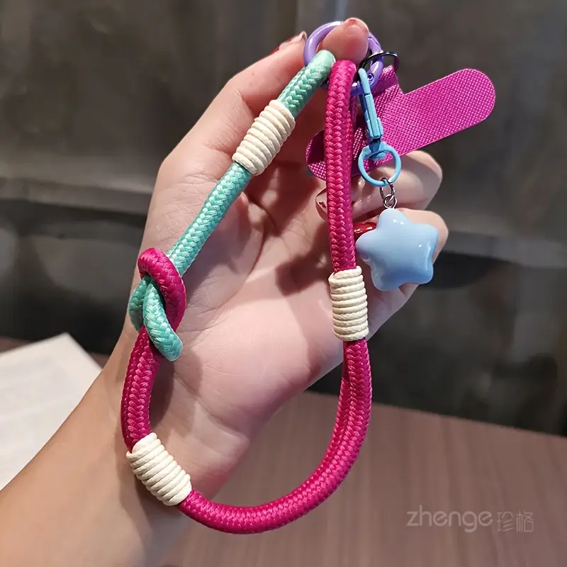 Foto de Strap/correa de mano adaptable a cualquier celular.