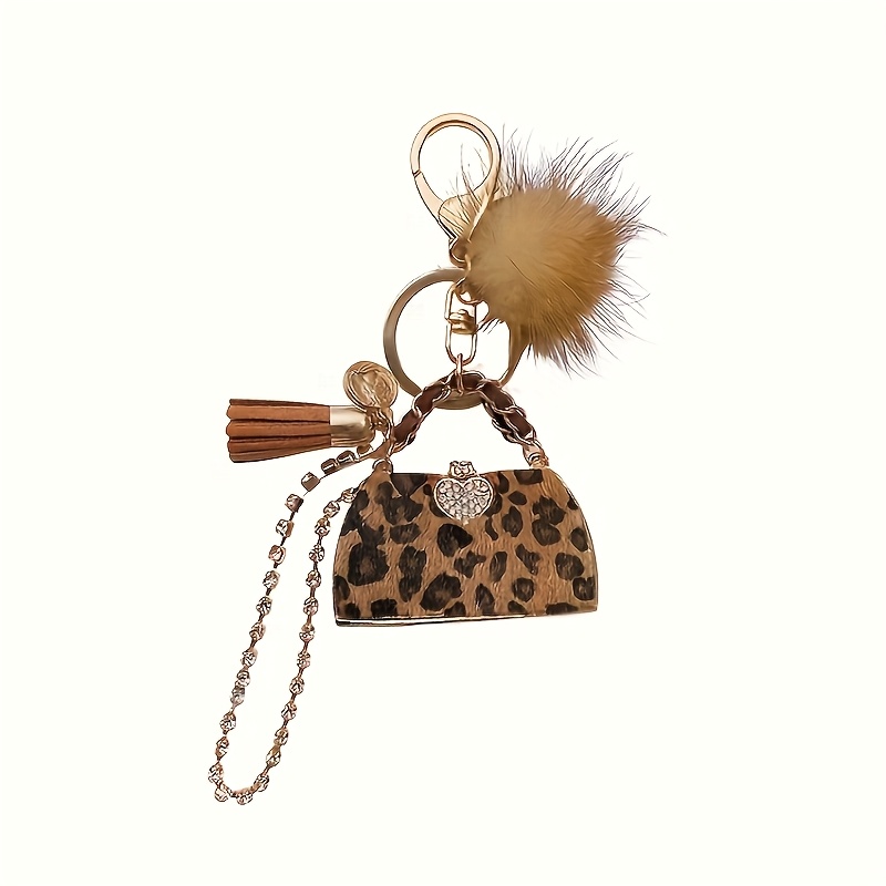 Image of 1pc Of Stylish Keychain Featuring A Chic Leopard Print, With A Heart-shaped Charm And Fringe - Made Of Soft Balls, Perfect For Enhancing Your Bag