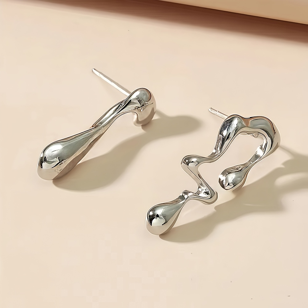 pair of hypoallergenic   steel earrings for women minimalist curved teardrop designs comfortable lightweight jewelry for daily wear parties summer mother s day gift versatile elegant accessories Product details 0