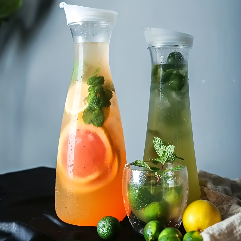 4pcs juice containers with flip tab lid durable reusable plastic pitchers for iced tea cold brew more birthdays picnics outdoor parties great gift for housewarming wedding outdoor sleek drink containers durable plastic bottles beverage coolers Product details 2