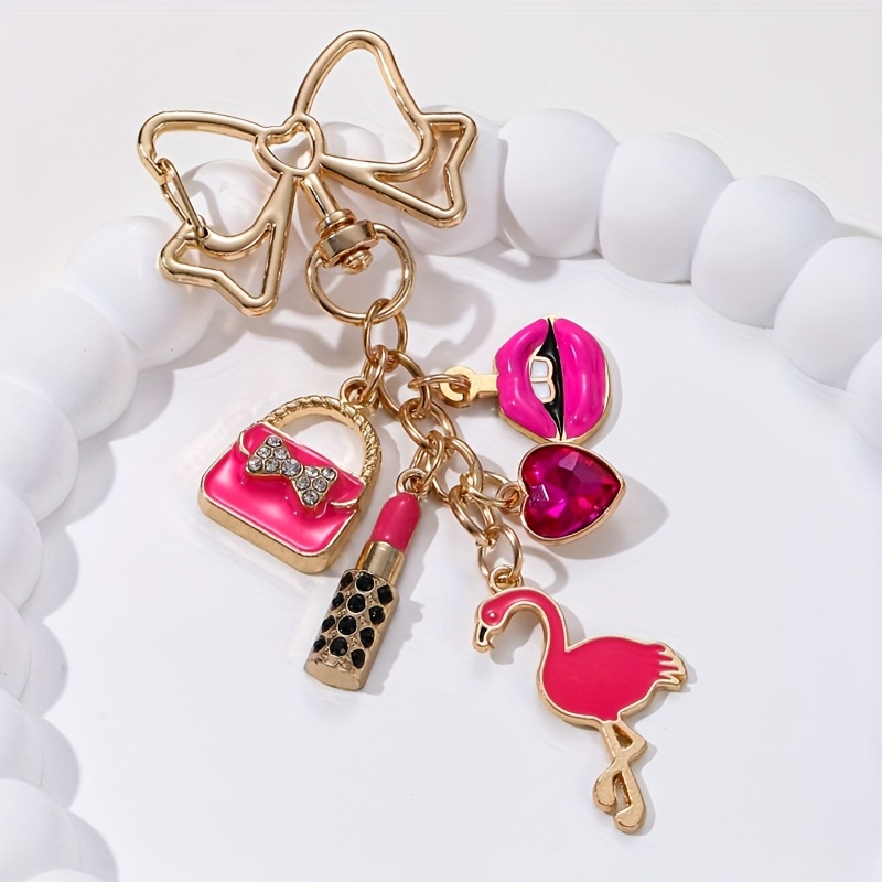 

Festive Flamingo Keychain: , Heart, And Flamingo Charm With Golden Bow And Chain - Perfect Gift For Women's Day