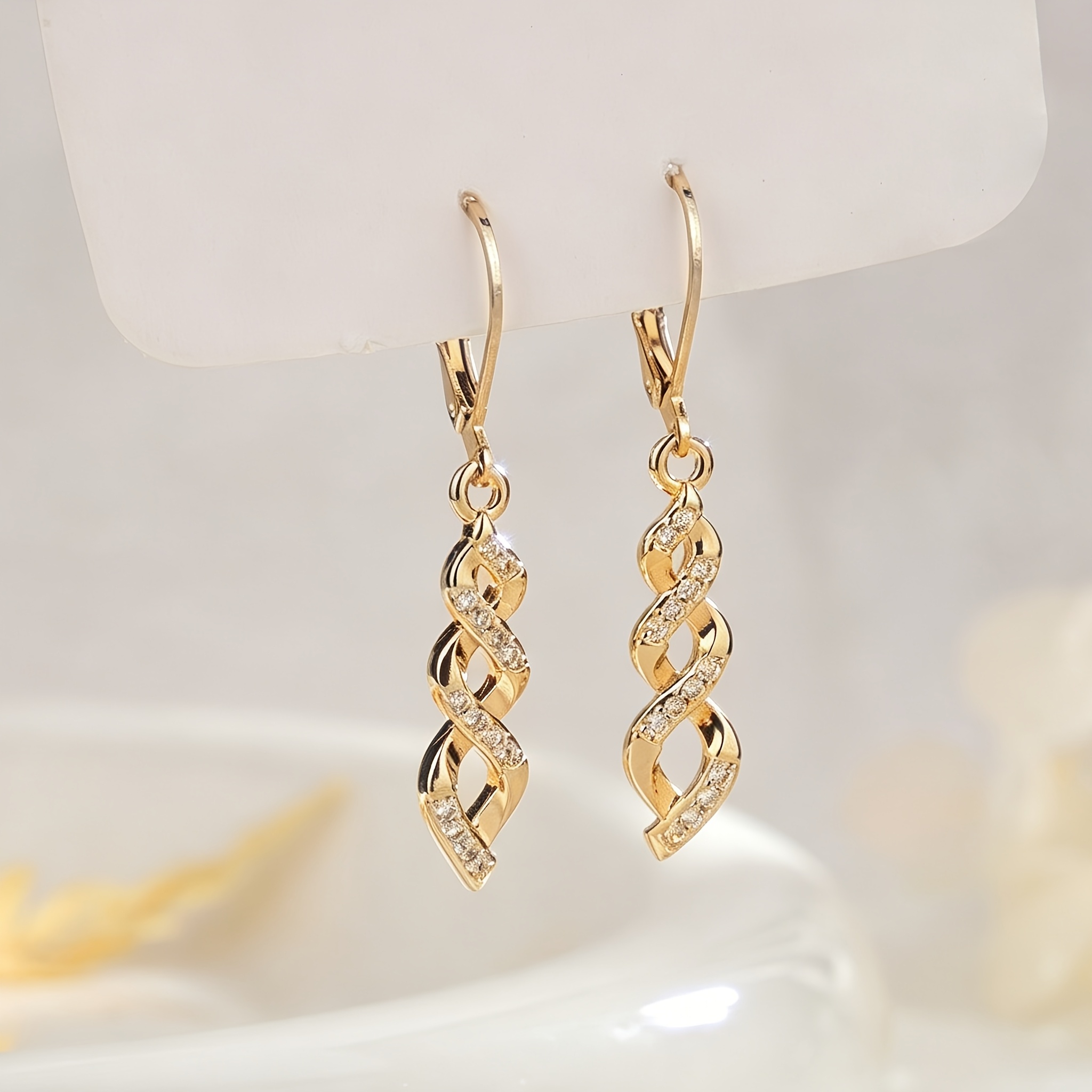 Image of A Pair Of Elegant And Luxurious Double-layered Spiral Copper Pendant Earrings With An Infinity Symbol Design, Suitable For Women' Gifting And Banquet Occasions. High-quality Fashion Jewelry