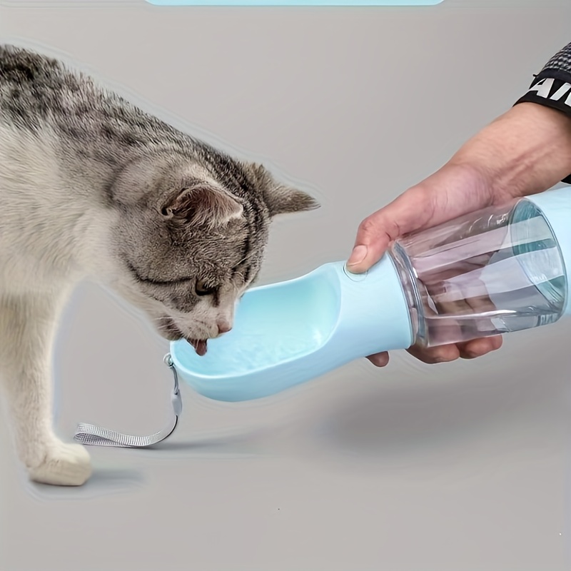 a portable outdoor pet water and food cup for walking dogs   in one outdoor pet water and food container a dog water bottle a dog treat bag a pet   dog snacks pet lunch dog food dispenser dog water dispenser dog feeder Product details 7
