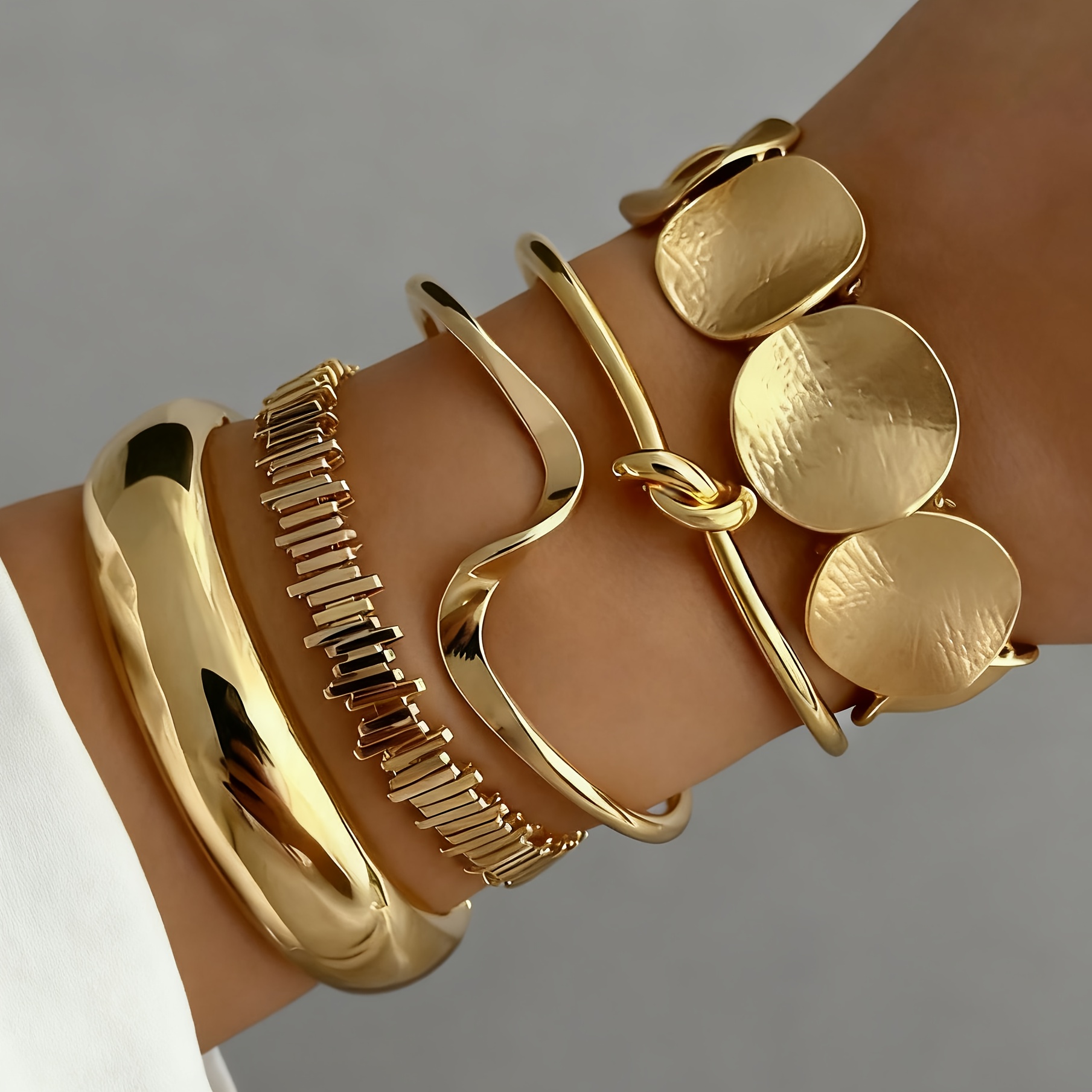 Image of 5-piece Set Of Women's Stacked Bangle Bracelets In A And Style, Featuring Creative Geometric Texture Designs. Suitable For Versatile Daily Wear And As A Gift For Celebrating Christmas