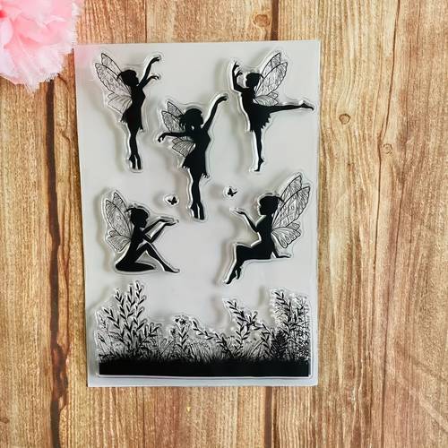 doorzichtige met fee, vlinder en grasontwerpen voor doe-het-zelf scrapbooking, kaartcreatie en albumdecoratie met siliconenafsluiting craft rubber.