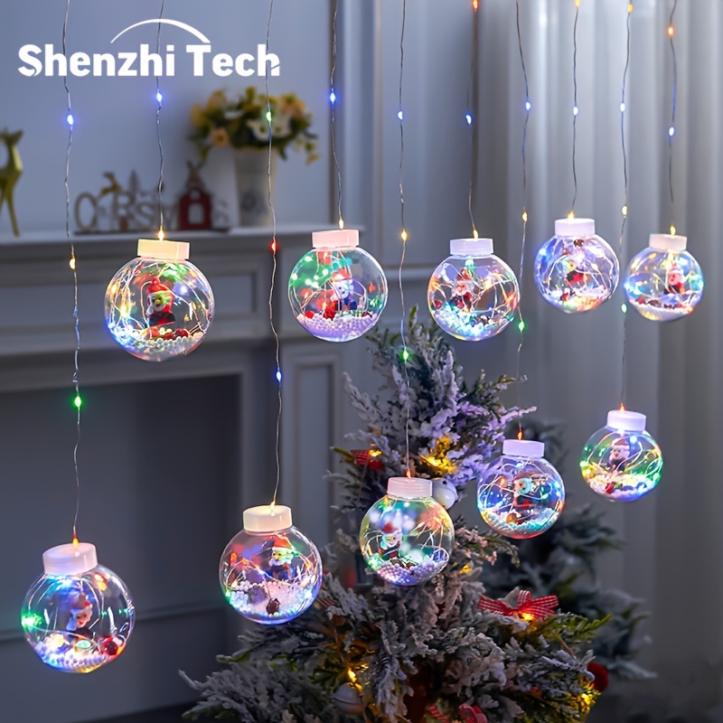 

de Noël à LED Shenzhi Tech, boule à souhaits Art déco Père Noël, décoration intérieure, 10 ornements multicolores, à piles avec commande par bouton-poussoir pour des fêtes