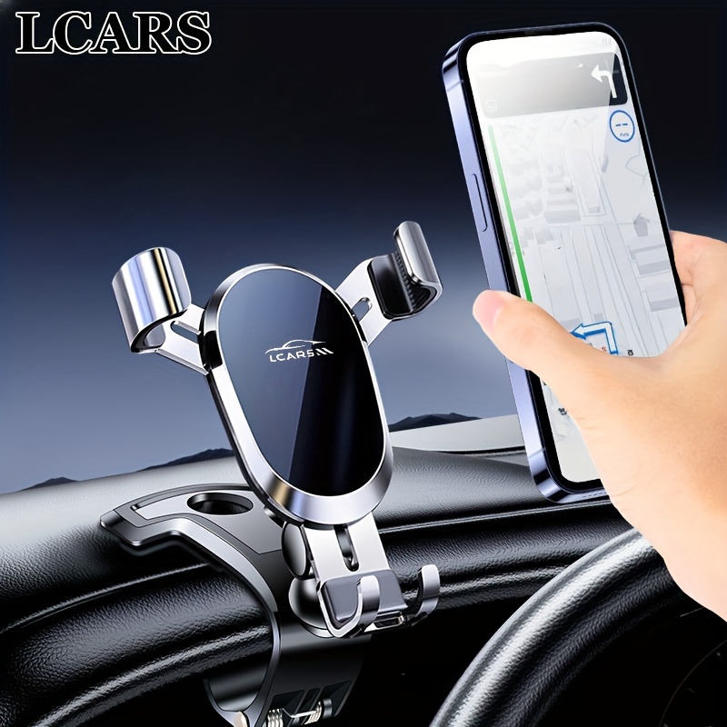 

New Model Of Car Phone Holder For Dashboard, Multifunctional Support For Car Interior, Designed To Fix And Stabilize Mobile Phones For Navigation Inside The Car.