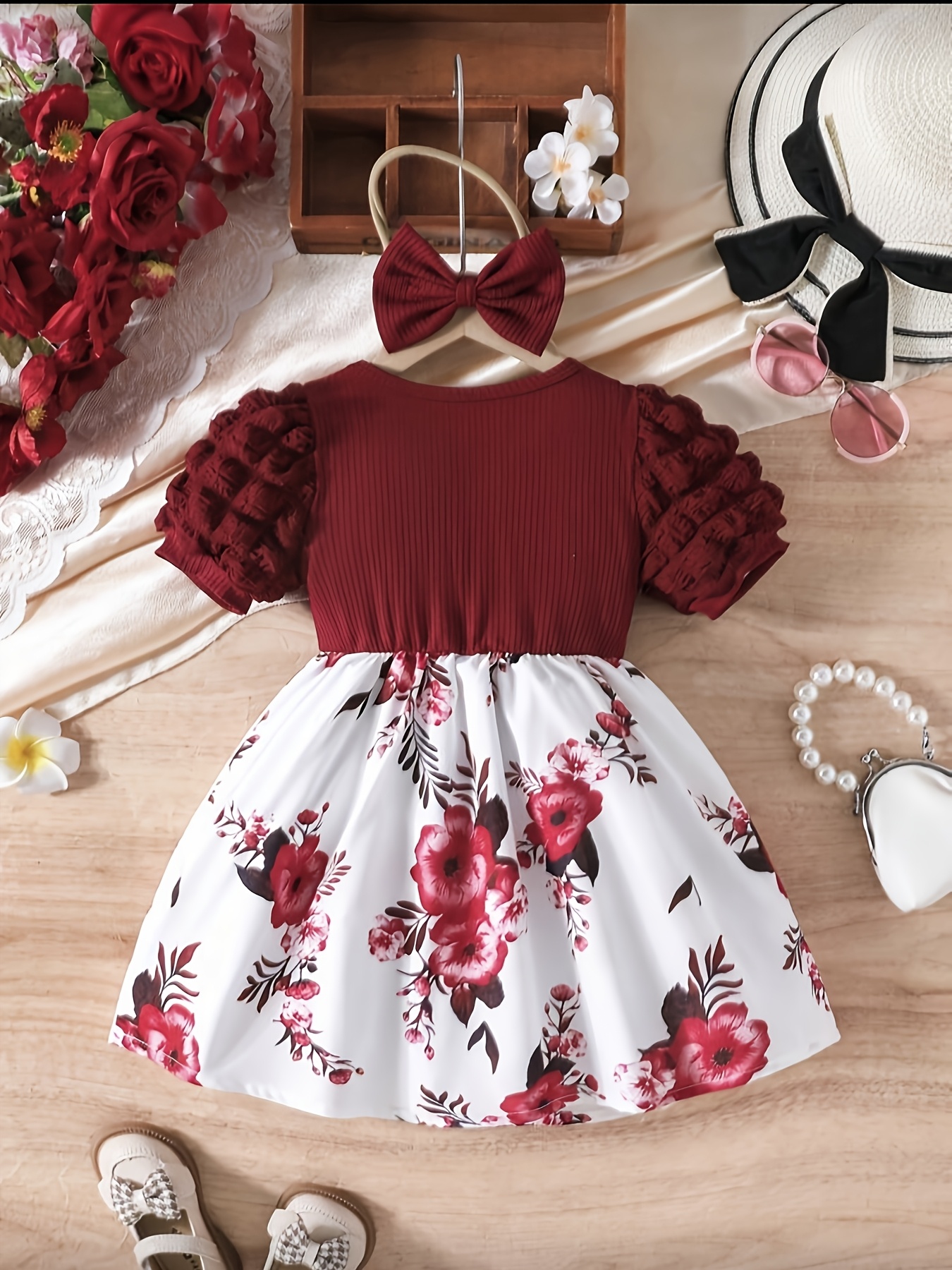 This Summer Floral Print Short Dress with Puff Sleeves Is Perfect for Young Girls in The Toddler Stage. It Features a Layered Ruffle Design And Comes with a Matching Bow Headband
