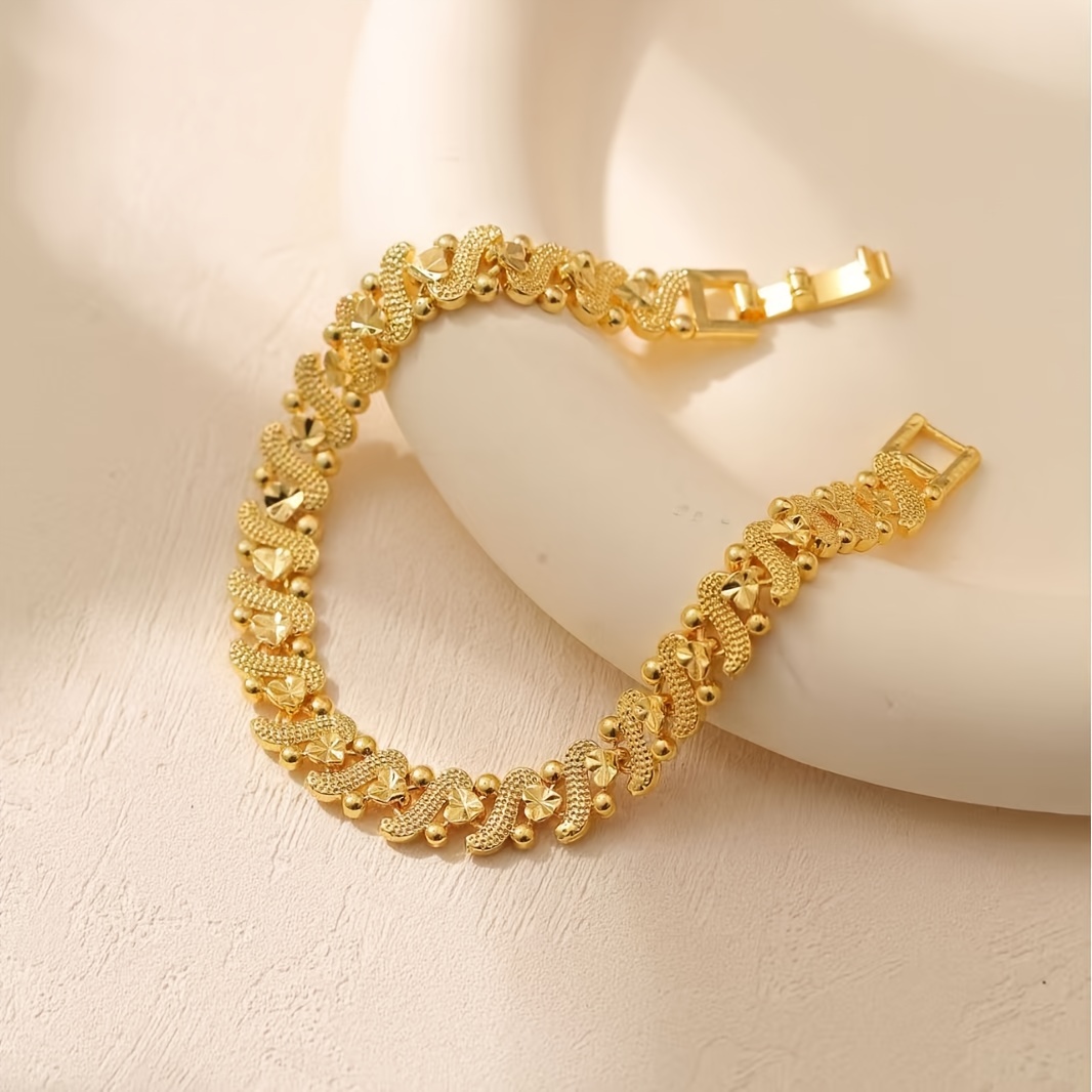 E-shop Europäische amerikanische trendige S-förmige Schließe Herzförmige Uhrenarmband-Kette, goldenes modisches Luxus-Armband für Damen, geeignet zum