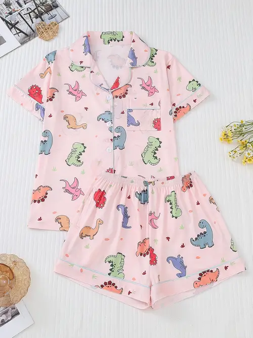two piece womens pajama set knitted fabric short sleeved button up top and matching shorts collar and pocket details full body cartoon print elegant pajama set suitable for womens adult pajama set