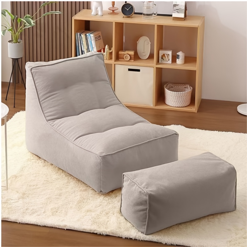 A Comfortable Sofa That Can Be Adjusted for Reclining Or Sleeping, a Single-Person Lounge Chair, a Small Tatami Bed for Humans Resembling a Dog Bed, And a Bean Bag Lounge Chair