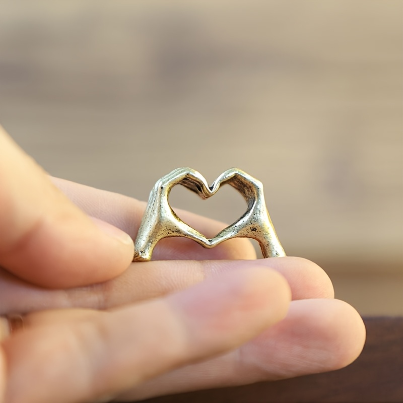 TEMU Statuina 1 pz a forma di cuore che si tengono, realizzata meticolosamente per catturare l'amore , che un' . Perfetta come regalo per gli