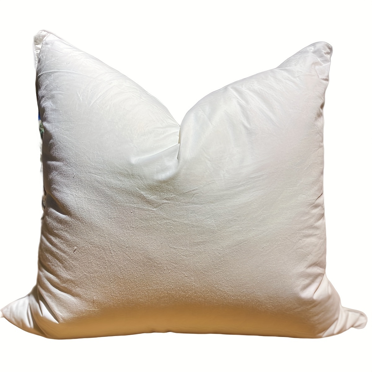 

Un oreiller en plumes de canard et duvet, accessoire de literie blanc luxueux, et soutenant