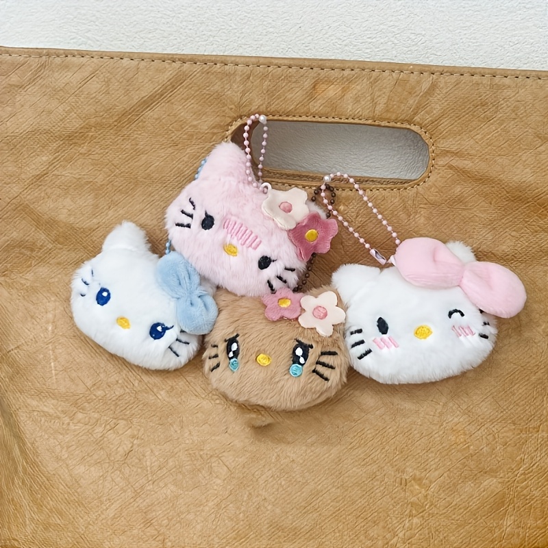 

Sac Sanrio avec des aux grands yeux, pendentif de poupée, chaton, trinket mignon en peluche de dessin