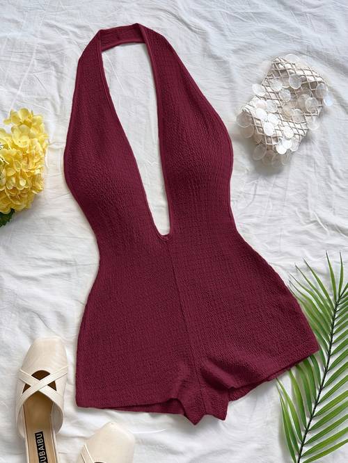 elegant and stylish and summer beach vacation jumpsuit for women featuring a solid color deep v neck halter beach pool parties and dates designed to the figure